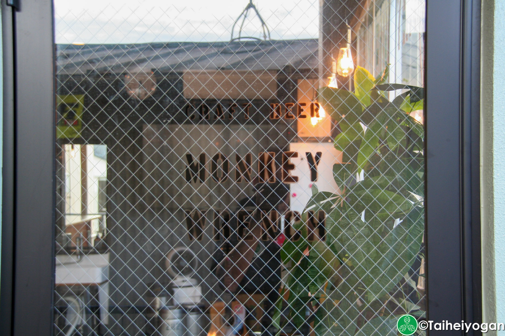 Monkey Wrench - Entrance - Sign